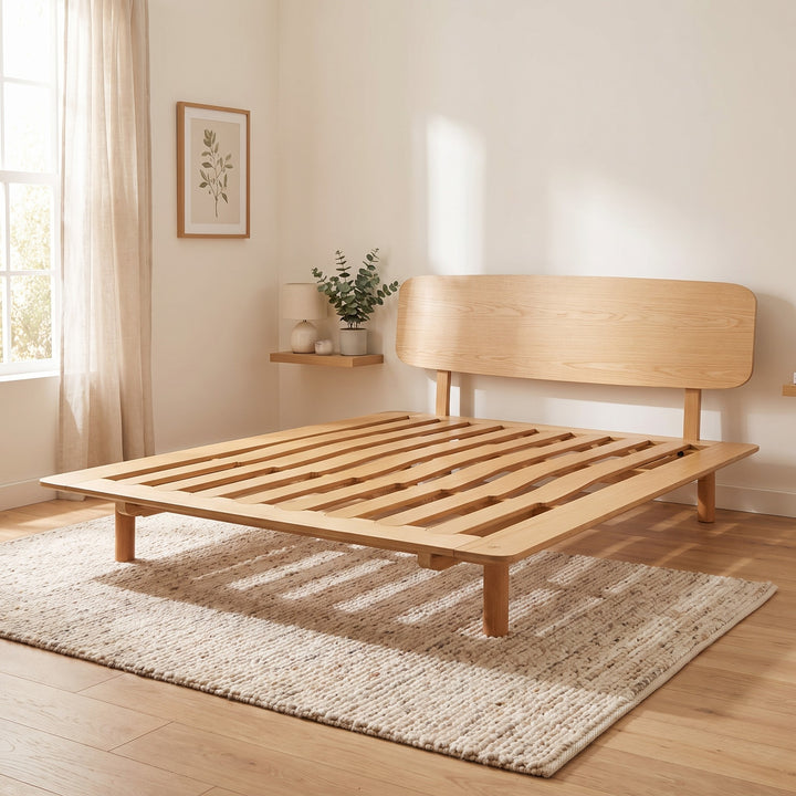 AVONEST bed frame in a Scandinavian-style bedroom in morning light